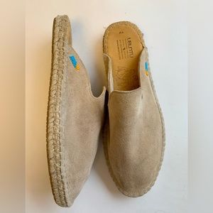 Mule slides in a brown suede.